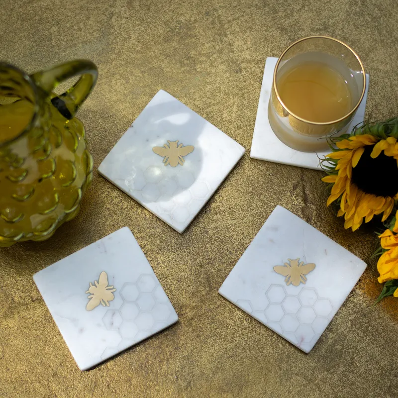 Culinary Concepts Set of Four Marble Laser Etched Coasters with Brass Bee-1